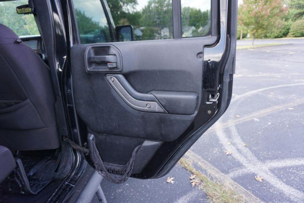 used 2013 Jeep Wrangler Unlimited car, priced at $12,900