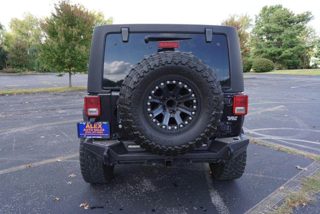 used 2013 Jeep Wrangler Unlimited car, priced at $12,900