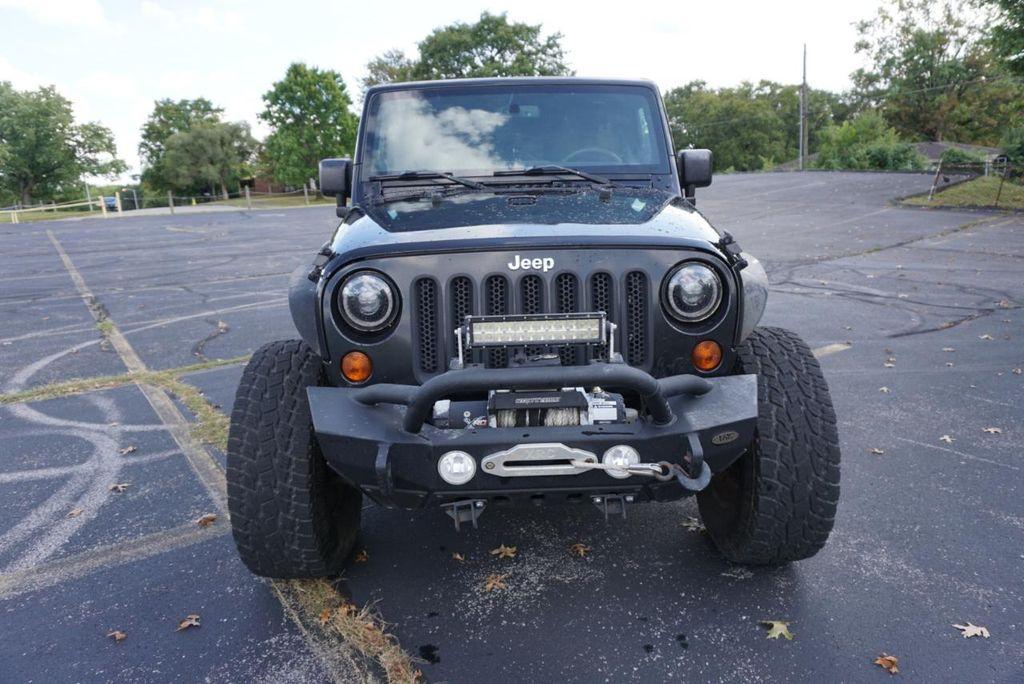 used 2013 Jeep Wrangler Unlimited car, priced at $12,900