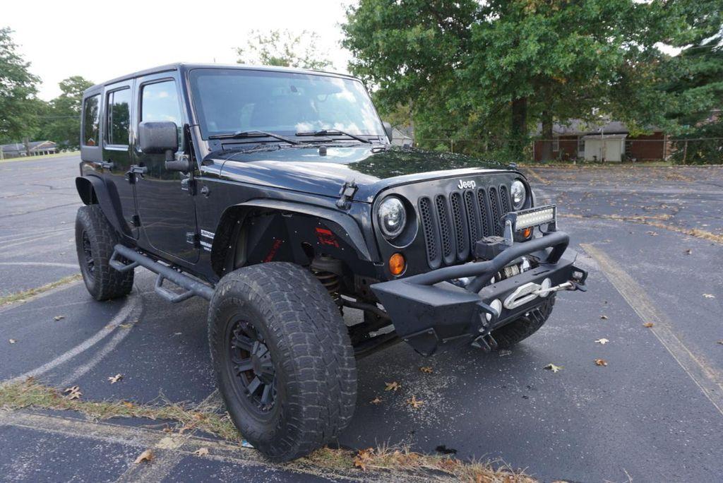 used 2013 Jeep Wrangler Unlimited car, priced at $12,900