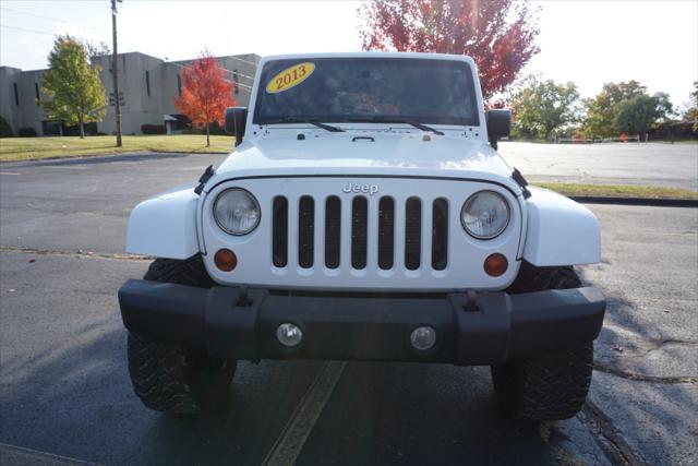 used 2013 Jeep Wrangler Unlimited car, priced at $15,900