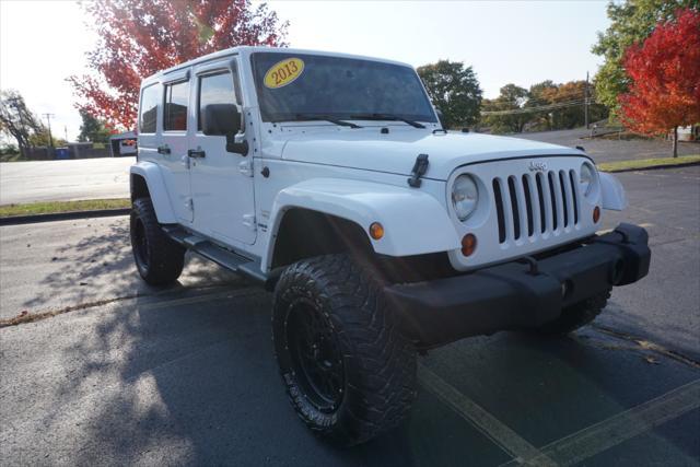 used 2013 Jeep Wrangler Unlimited car, priced at $15,900