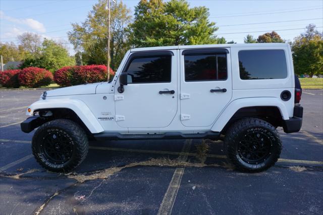 used 2013 Jeep Wrangler Unlimited car, priced at $15,900