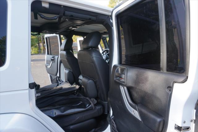 used 2013 Jeep Wrangler Unlimited car, priced at $15,900