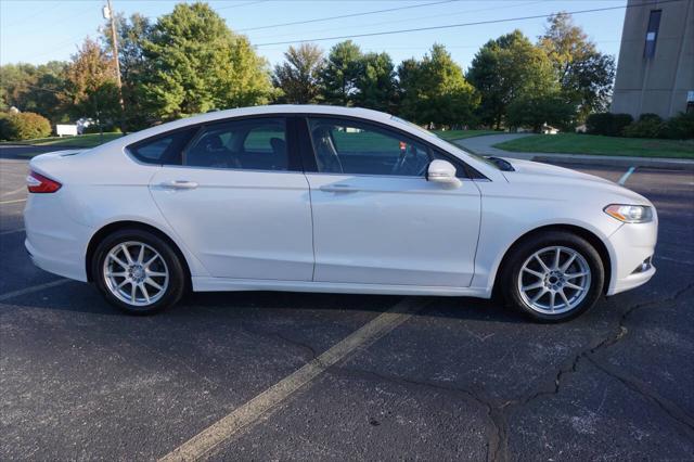 used 2014 Ford Fusion car, priced at $6,950