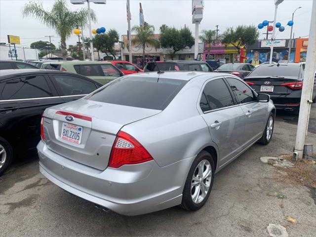 used 2012 Ford Fusion car, priced at $7,195