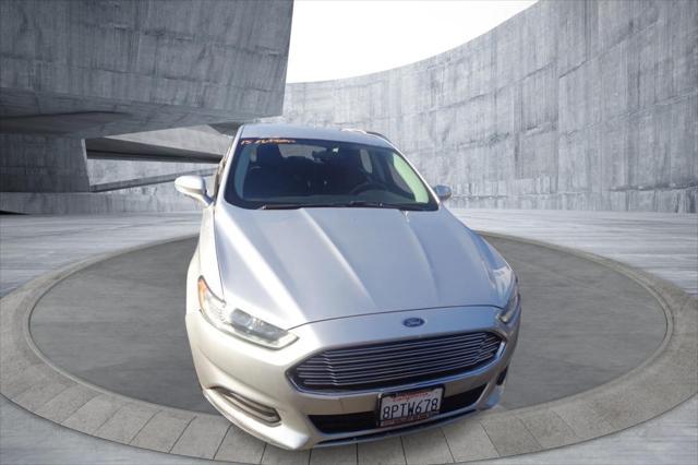 used 2015 Ford Fusion car, priced at $10,195