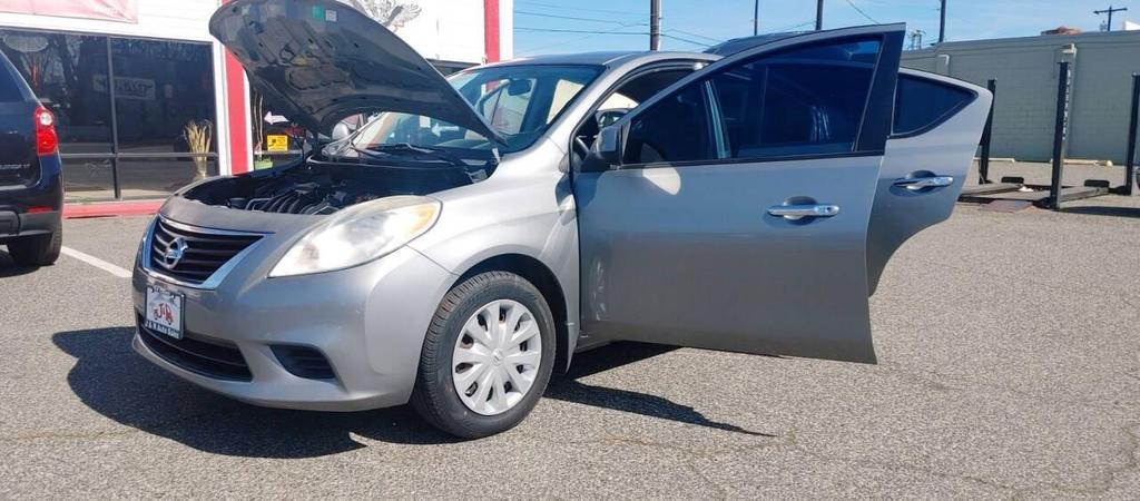 used 2012 Nissan Versa car, priced at $3,990