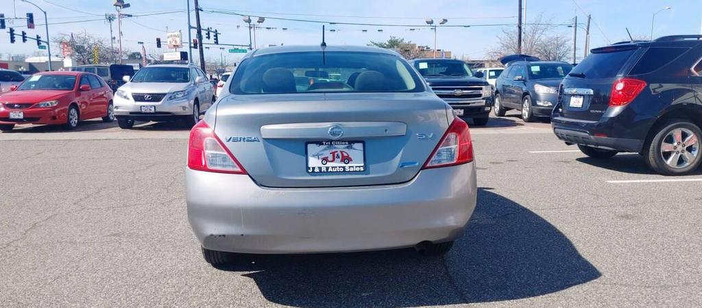 used 2012 Nissan Versa car, priced at $3,990