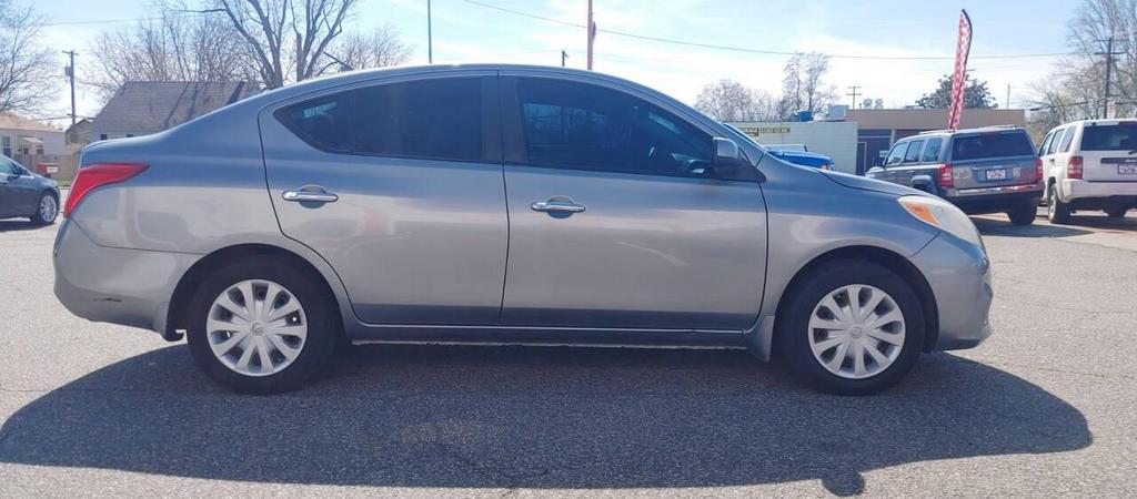 used 2012 Nissan Versa car, priced at $3,990