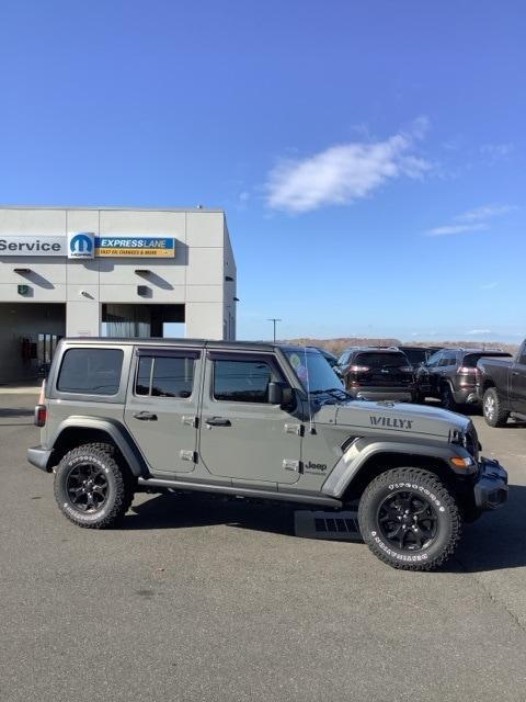 used 2021 Jeep Wrangler Unlimited car, priced at $33,899