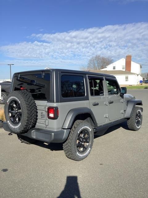 used 2021 Jeep Wrangler Unlimited car, priced at $33,899