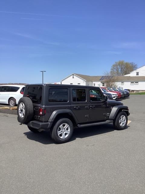 used 2021 Jeep Wrangler Unlimited car, priced at $32,386