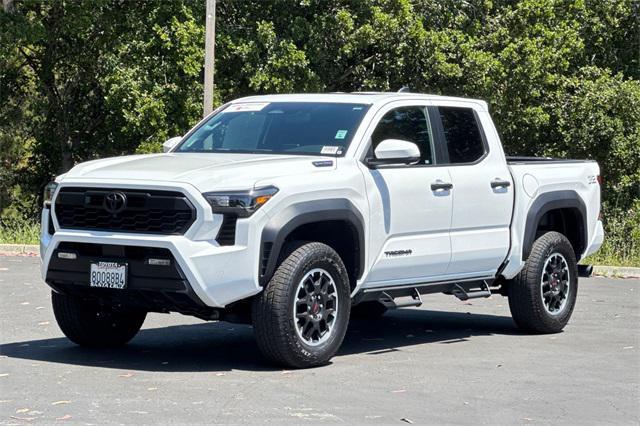 used 2024 Toyota Tacoma car, priced at $49,995