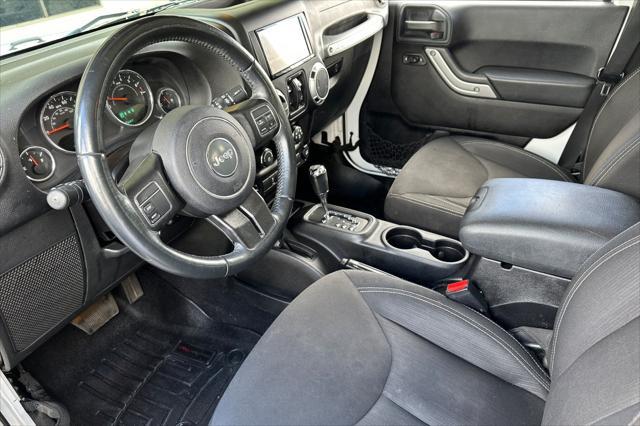 used 2015 Jeep Wrangler Unlimited car, priced at $17,776