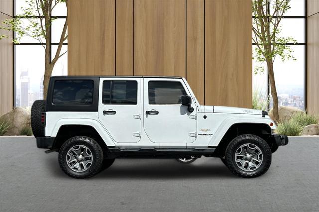 used 2015 Jeep Wrangler Unlimited car, priced at $17,776