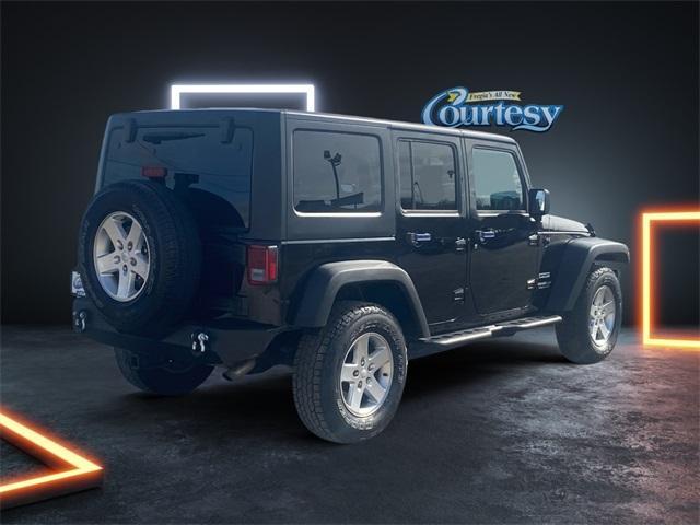 used 2015 Jeep Wrangler Unlimited car, priced at $19,128