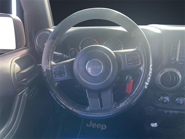 used 2015 Jeep Wrangler Unlimited car, priced at $19,128