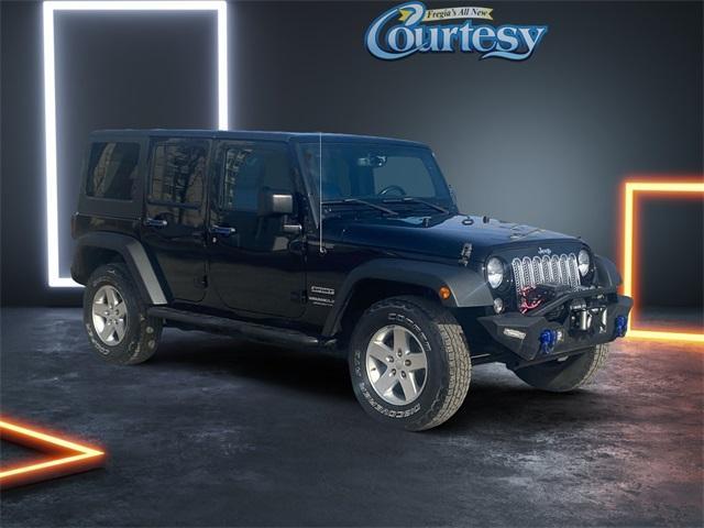 used 2015 Jeep Wrangler Unlimited car, priced at $19,128