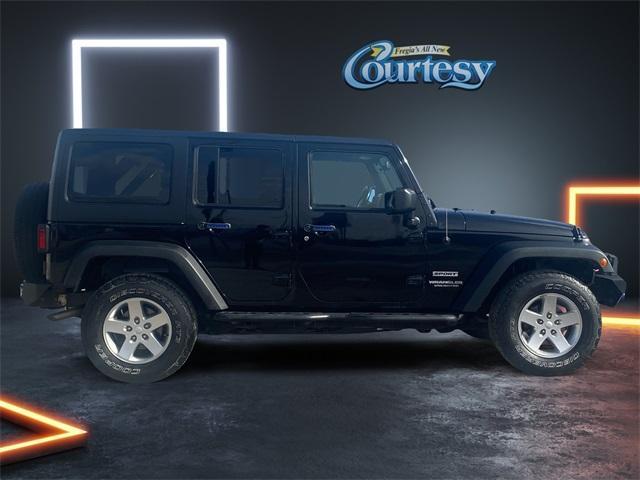 used 2015 Jeep Wrangler Unlimited car, priced at $19,128