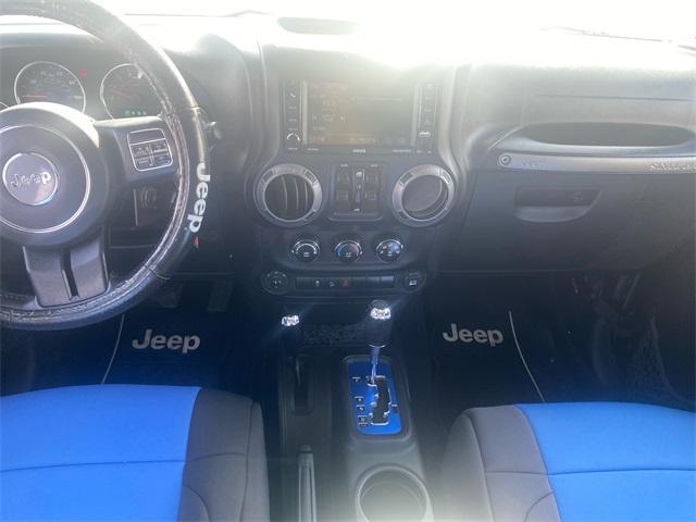 used 2015 Jeep Wrangler Unlimited car, priced at $19,128