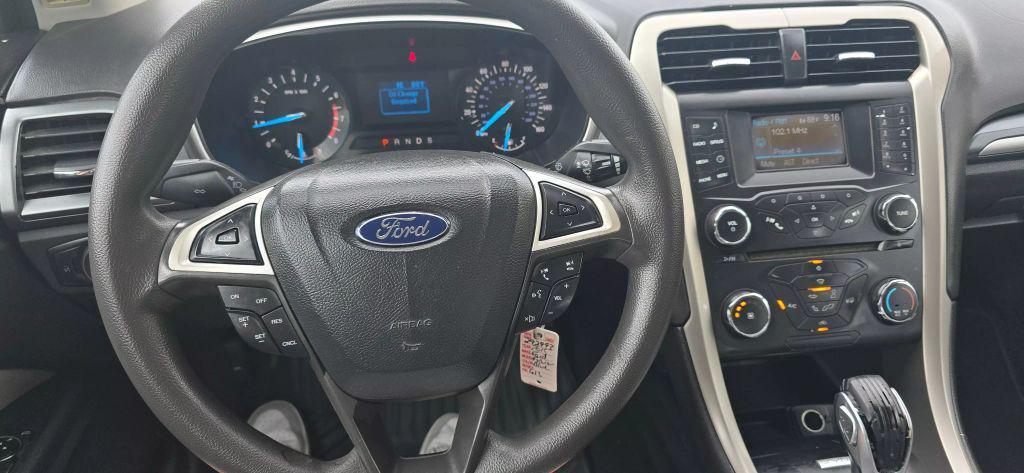 used 2015 Ford Fusion car, priced at $5,880