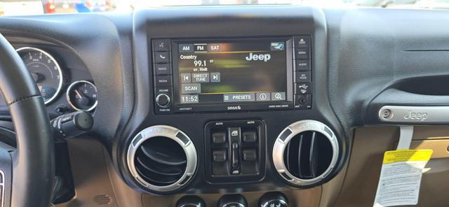 used 2013 Jeep Wrangler Unlimited car, priced at $17,450