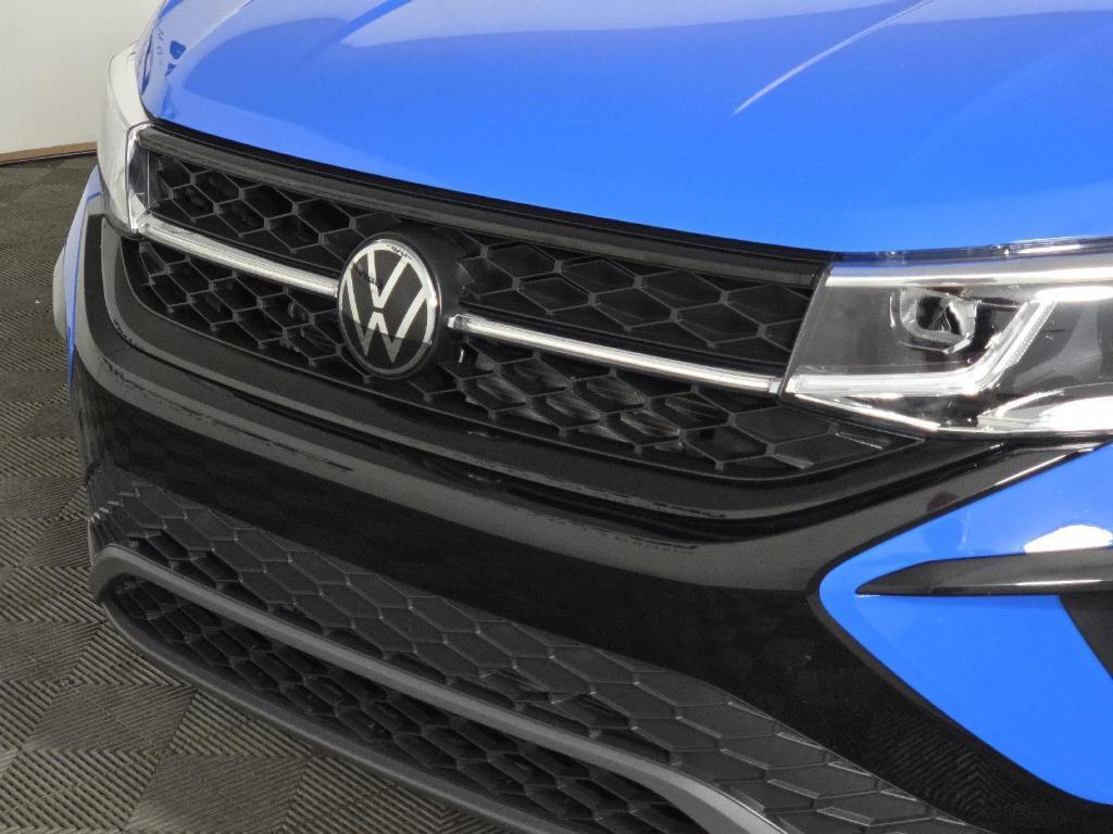 used 2024 Volkswagen Taos car, priced at $28,000