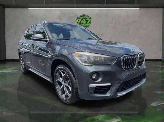 used 2018 BMW X1 car, priced at $13,595