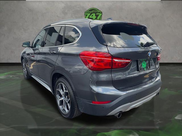 used 2018 BMW X1 car, priced at $13,595