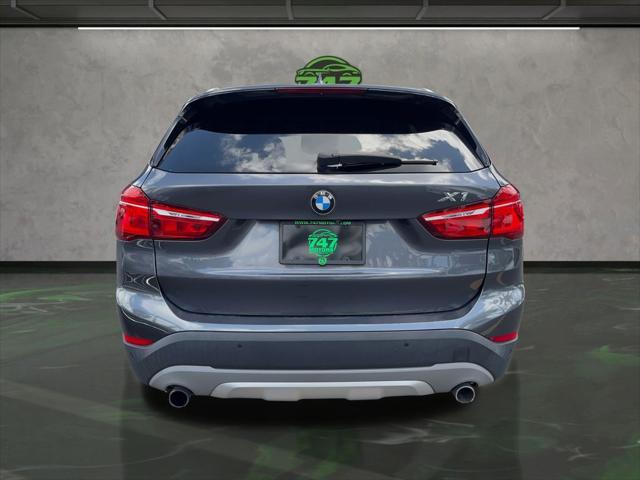 used 2018 BMW X1 car, priced at $13,595