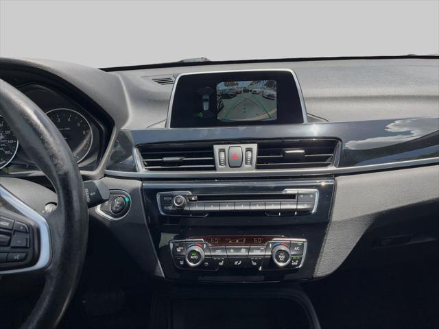 used 2018 BMW X1 car, priced at $13,595