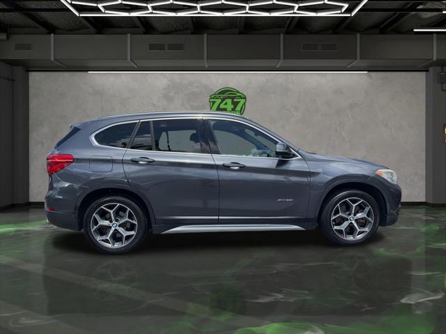 used 2018 BMW X1 car, priced at $13,595