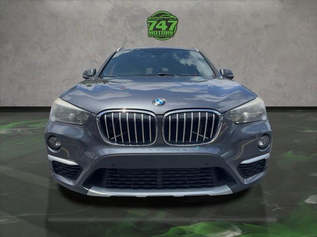 used 2018 BMW X1 car, priced at $13,595