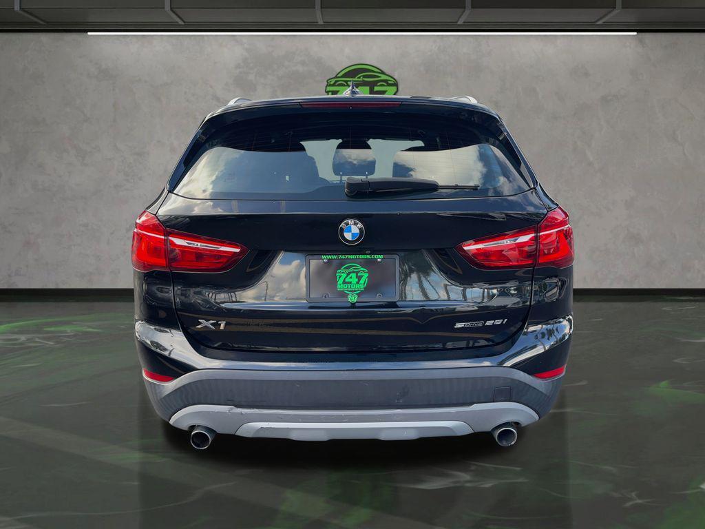 used 2018 BMW X1 car, priced at $12,895