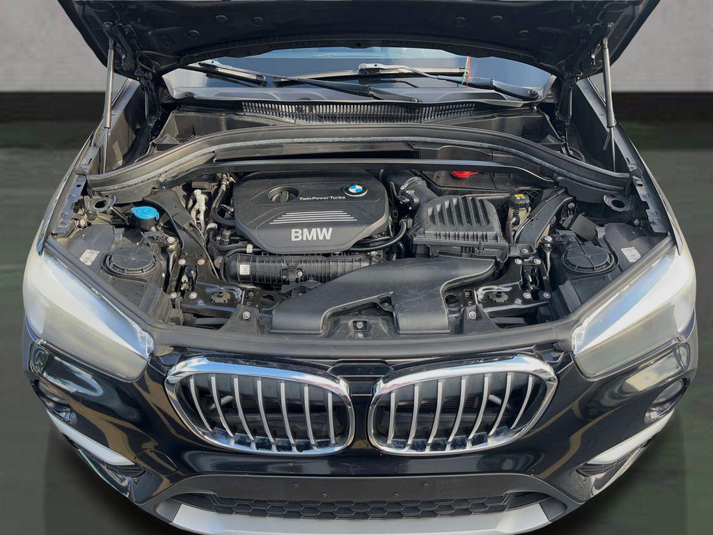 used 2018 BMW X1 car, priced at $12,895