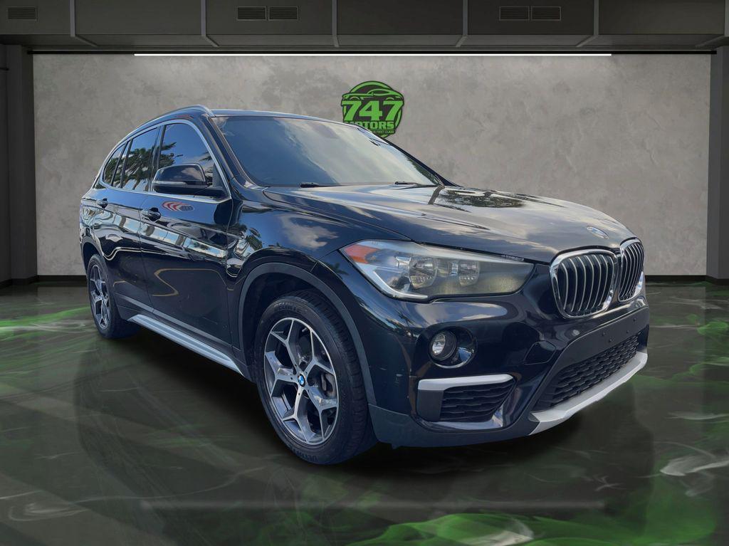 used 2018 BMW X1 car, priced at $12,895