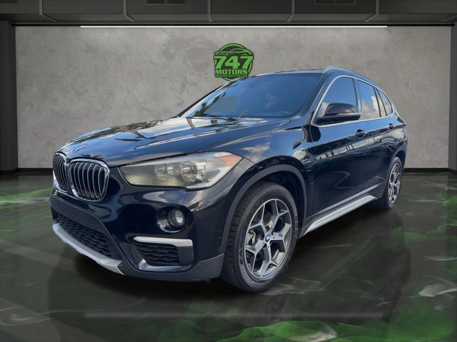 used 2018 BMW X1 car, priced at $12,895