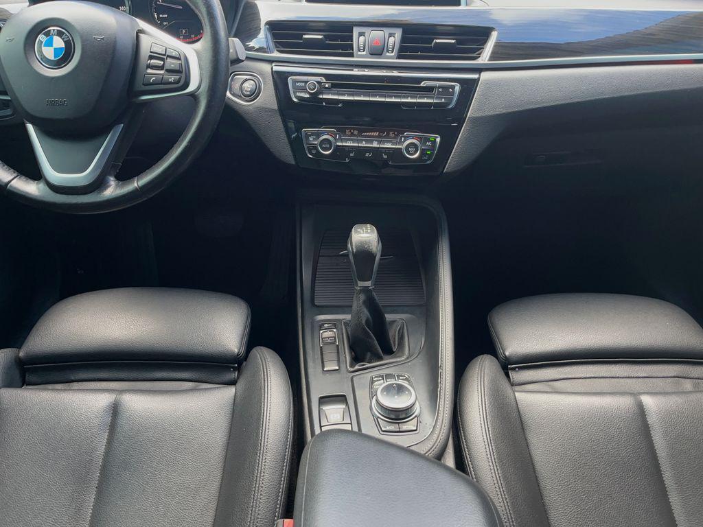 used 2018 BMW X1 car, priced at $12,895