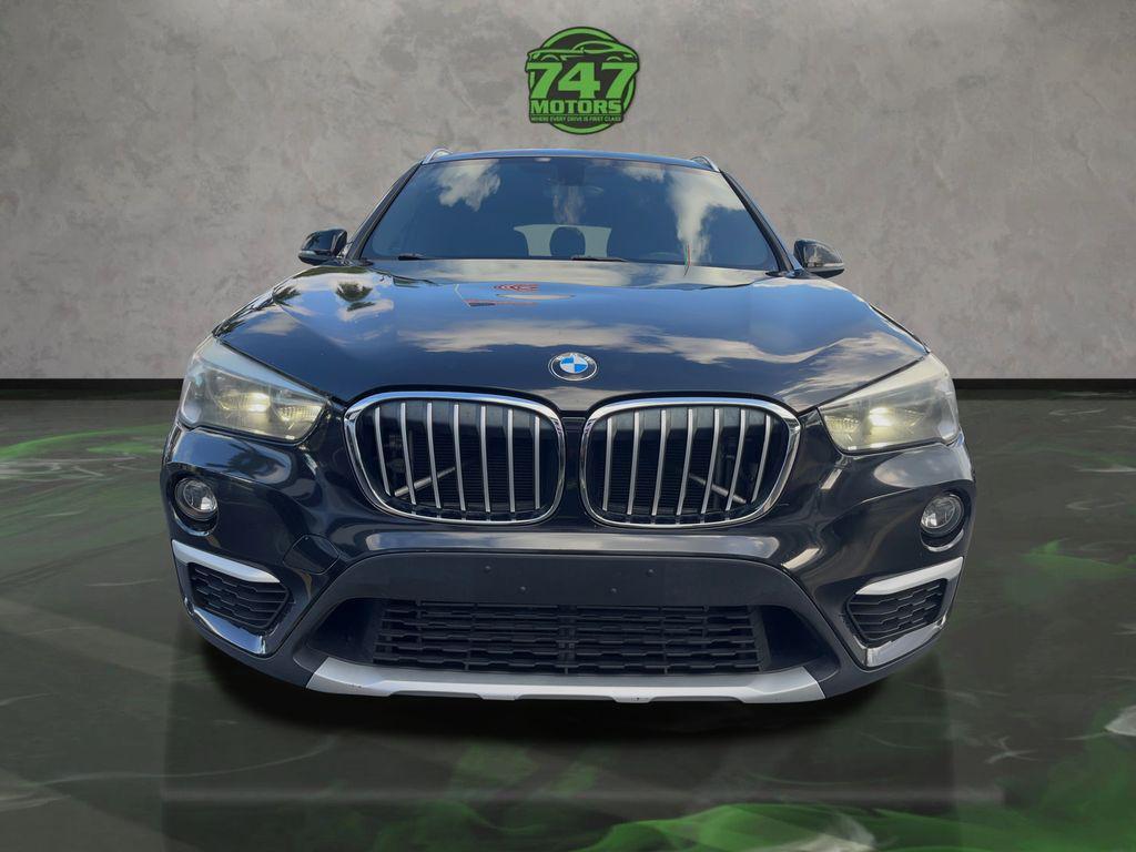 used 2018 BMW X1 car, priced at $12,895