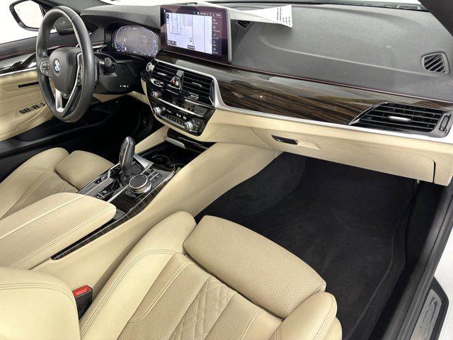 used 2023 BMW 530e car, priced at $42,023