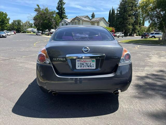 used 2010 Nissan Altima car, priced at $5,500