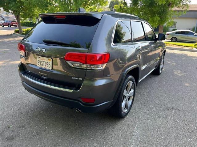 used 2014 Jeep Grand Cherokee car, priced at $9,999