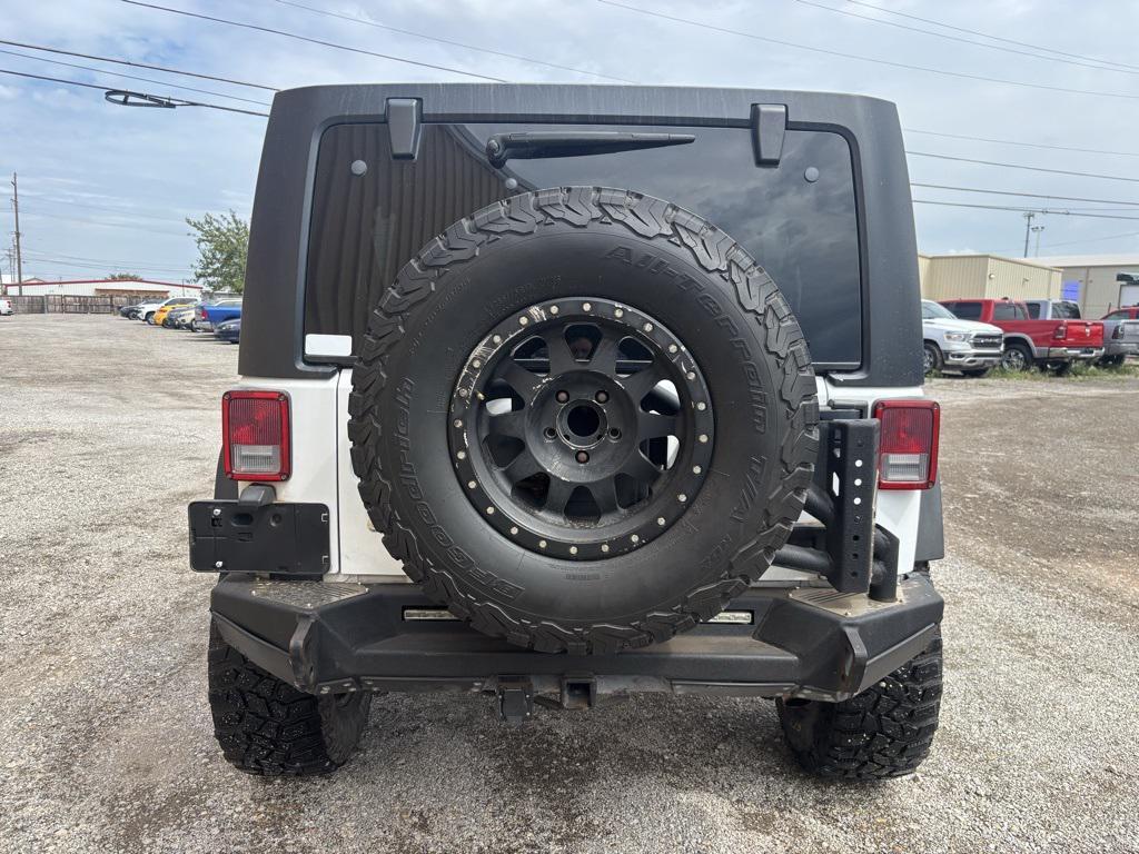 used 2016 Jeep Wrangler Unlimited car, priced at $23,900