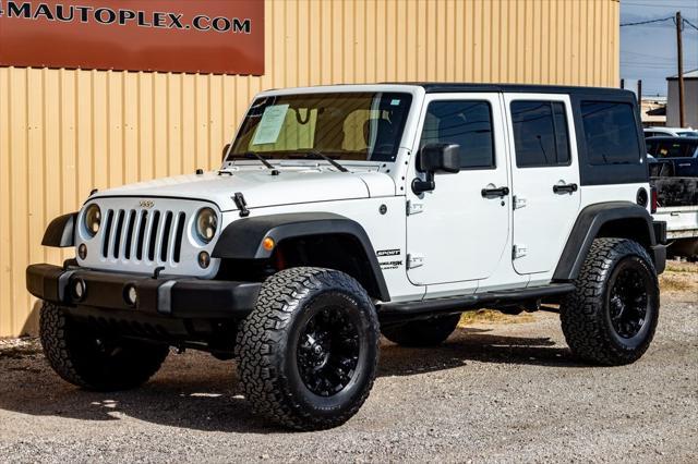 used 2018 Jeep Wrangler JK Unlimited car, priced at $23,900