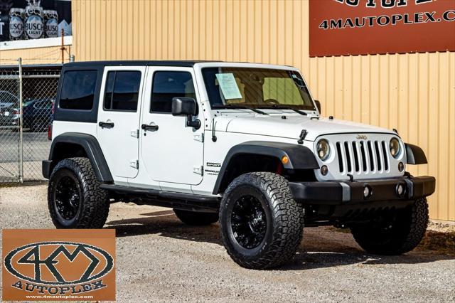 used 2018 Jeep Wrangler JK Unlimited car, priced at $23,900