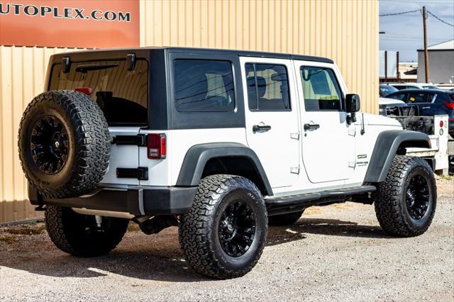 used 2018 Jeep Wrangler JK Unlimited car, priced at $23,900