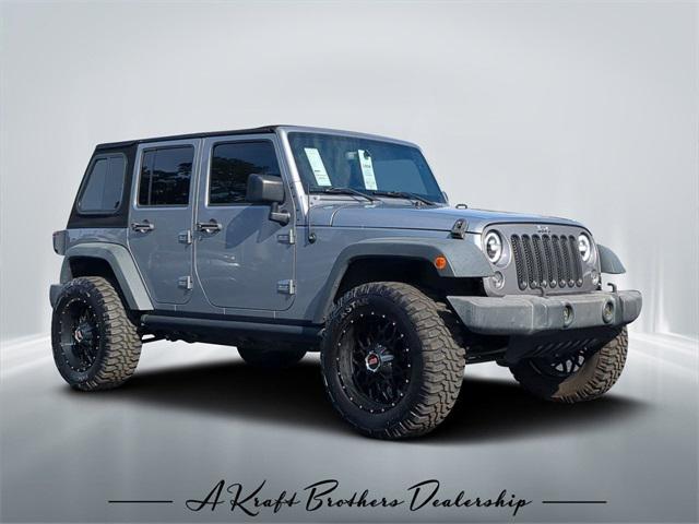 used 2015 Jeep Wrangler Unlimited car, priced at $18,990