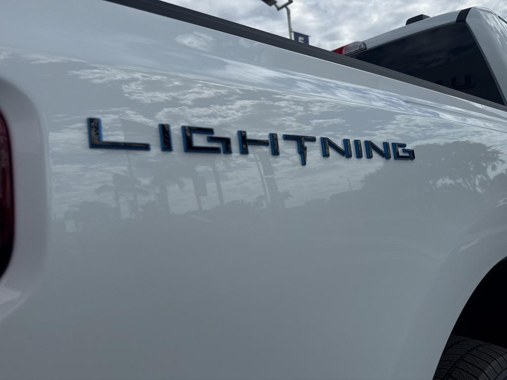 new 2025 Ford F-150 Lightning car, priced at $73,395