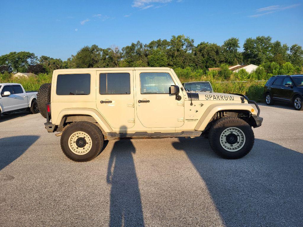 used 2011 Jeep Wrangler Unlimited car, priced at $11,450